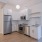 Open kitchen and living room with plenty of natural light.