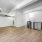 second floor living room with ample lighting