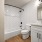 bright bathroom with herringbone tiling