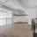 loft living space with exposed ac ducts