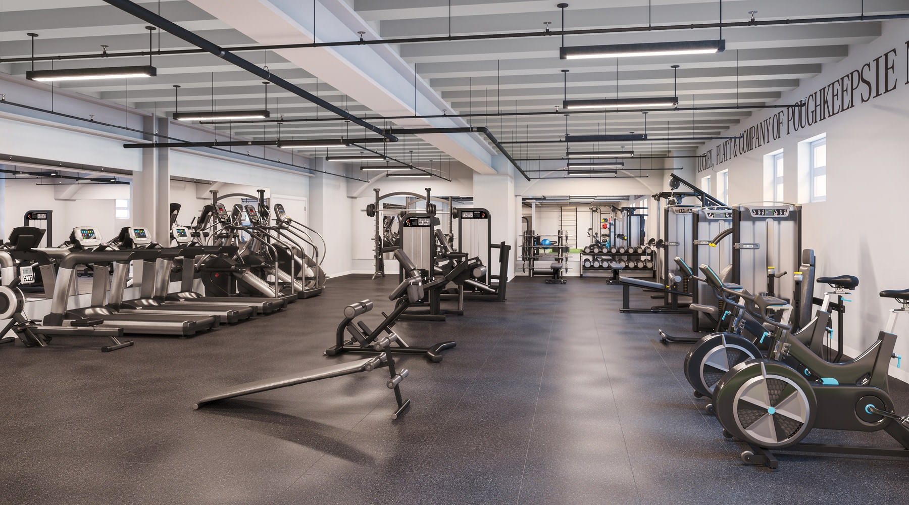 spacious fitness center with ample lighting throughout and various cardio and strength training equipment